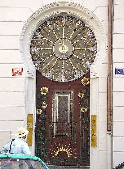 Art nouveau door with a clock